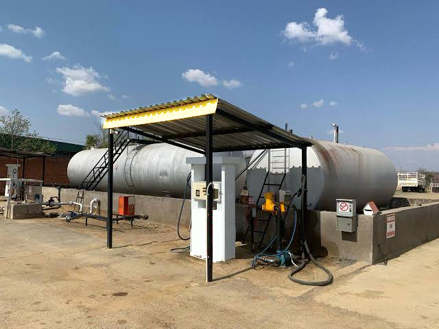 Fuel depot with dispensing canopy